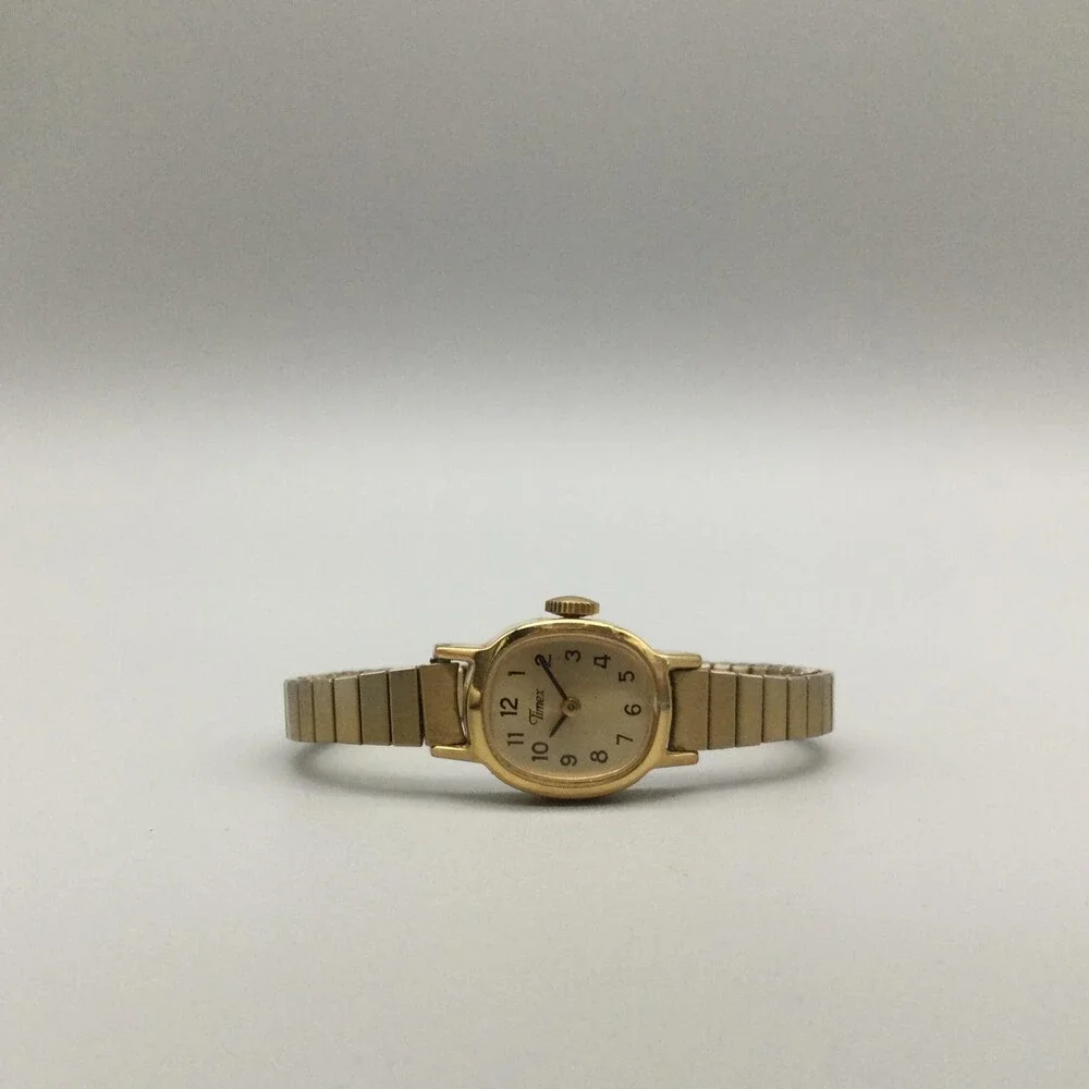 Vintage Timex Women Watch 17mm Champagne Dial Gold Manual Wind Stretch Band